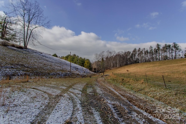 view of road with a rural view