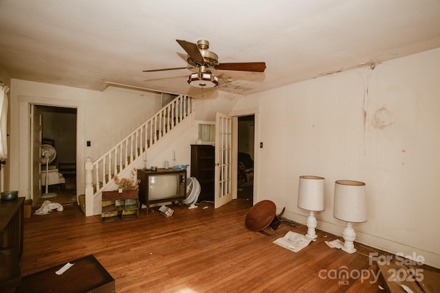 interior space featuring hardwood / wood-style flooring and ceiling fan