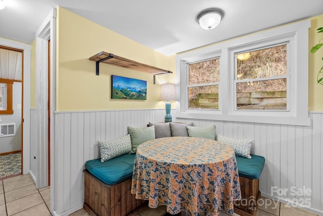 dining room with breakfast area and light tile patterned flooring