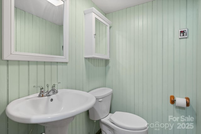 bathroom with toilet and sink