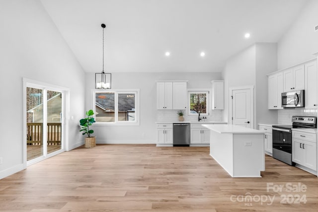 kitchen with white cabinetry and appliances with stainless steel finishes