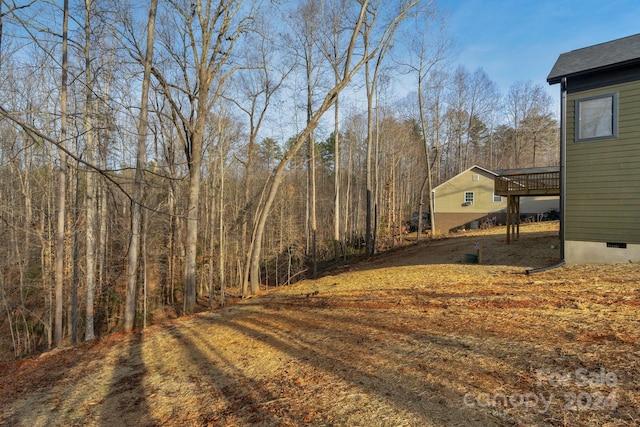 view of yard with a deck