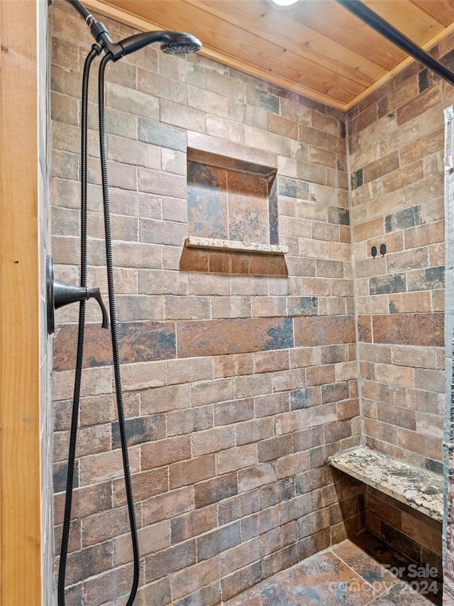 bathroom with wooden ceiling