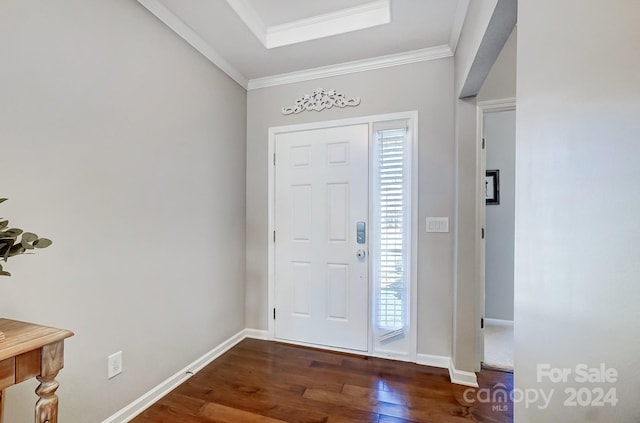 foyer featuring dark hardwood / wood-style flooring and crown molding