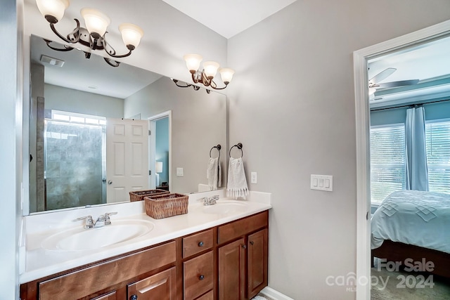 bathroom with vanity and an inviting chandelier