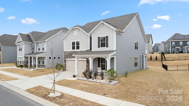 view of front of home featuring a garage and covered porch