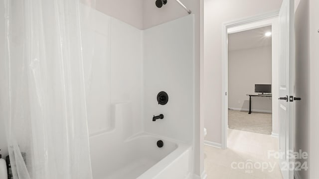 bathroom featuring tile patterned floors and shower / bath combination