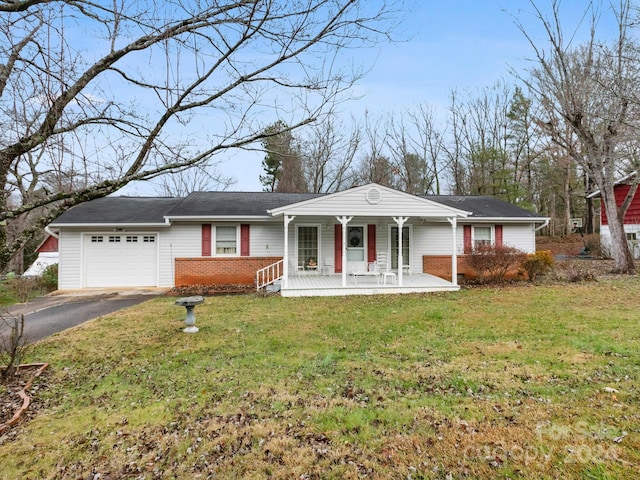 single story home with a front lawn and a garage