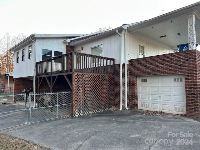 view of home's exterior with a balcony