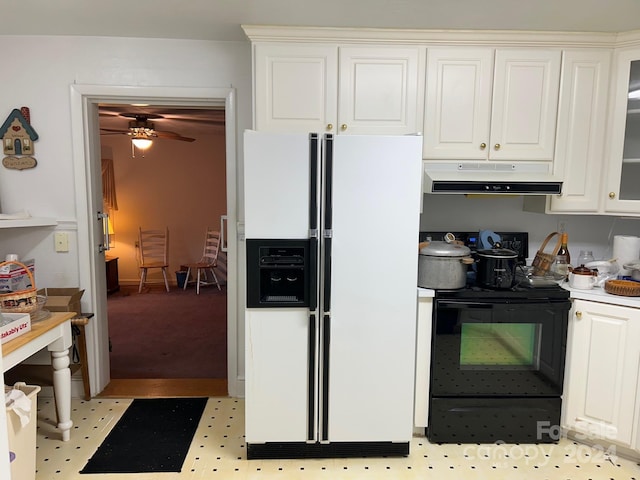 kitchen featuring light colored carpet, ceiling fan, white refrigerator with ice dispenser, electric range, and white cabinets