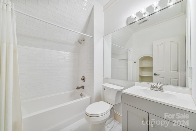 full bathroom featuring vanity, toilet, and shower / bath combo with shower curtain