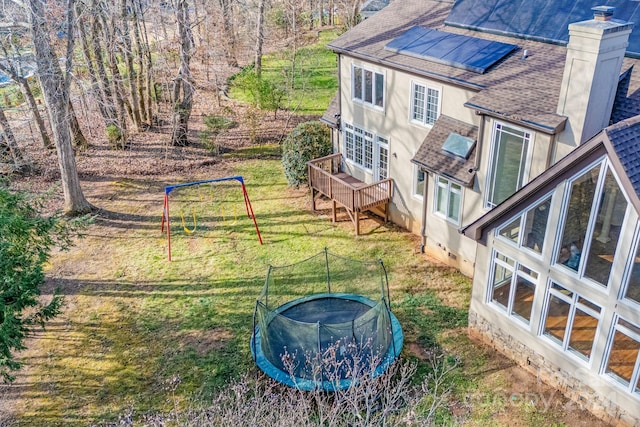 view of yard with a trampoline