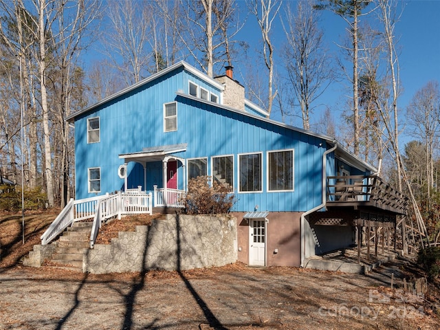 view of front of home with a deck