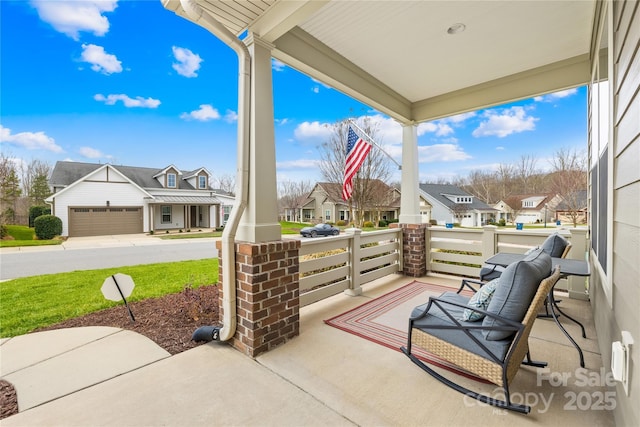 view of patio featuring covered porch