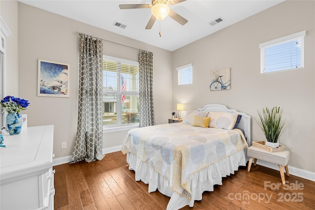 bedroom featuring ceiling fan and hardwood / wood-style floors