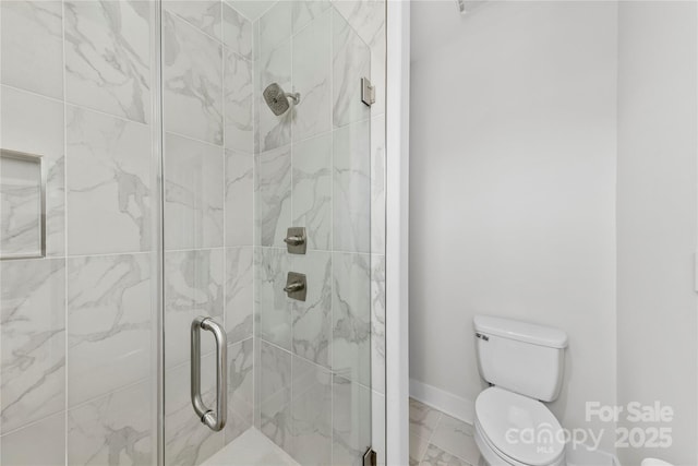 full bath featuring marble finish floor, a stall shower, toilet, and baseboards