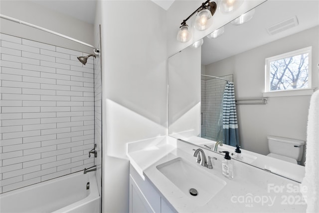 full bath with toilet, shower / tub combo, vanity, and visible vents