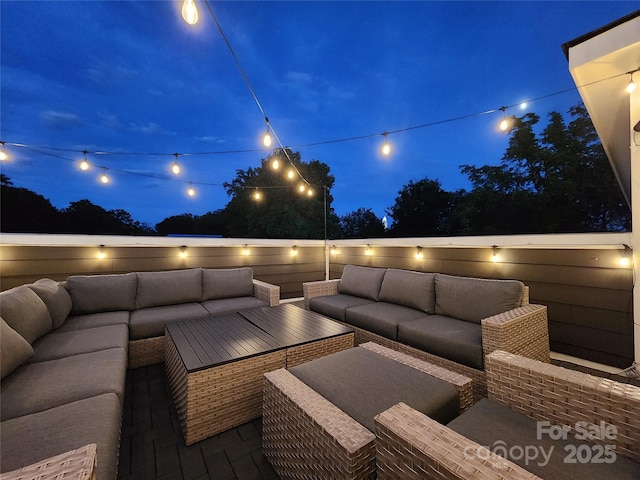 patio at night with an outdoor living space