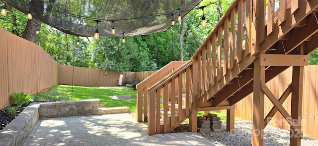 327 Coxe Ave, Charlotte, NC 28208 - fenced backyard with a patio area and stairs