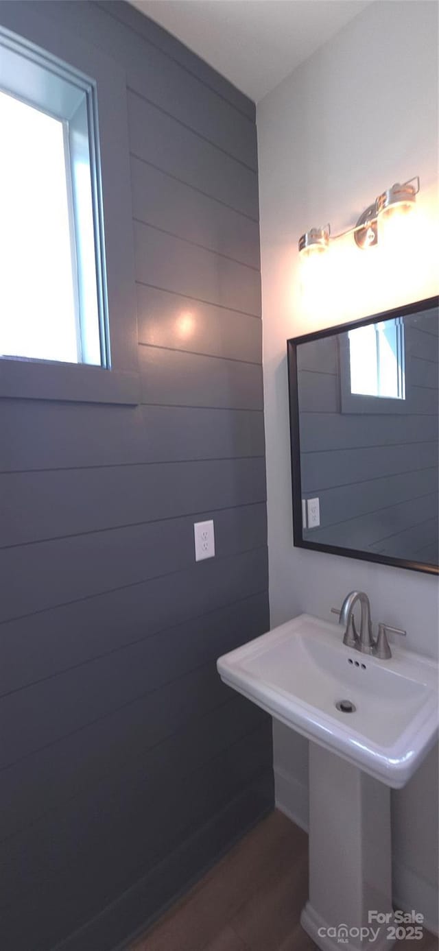 327 Coxe Ave, Charlotte, NC 28208 - bathroom with wood finished floors and a sink
