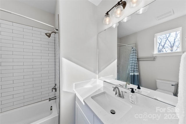 327 Coxe Ave, Charlotte, NC 28208 - bathroom with shower / bath combo, toilet, and vanity