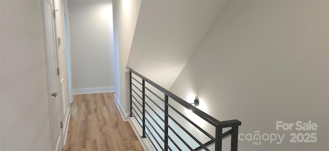 327 Coxe Ave, Charlotte, NC 28208 - stairs with wood finished floors and baseboards