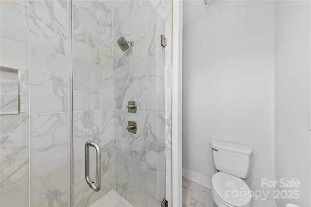327 Coxe Ave, Charlotte, NC 28208 - full bathroom featuring marble finish floors, toilet, a shower stall, and baseboards