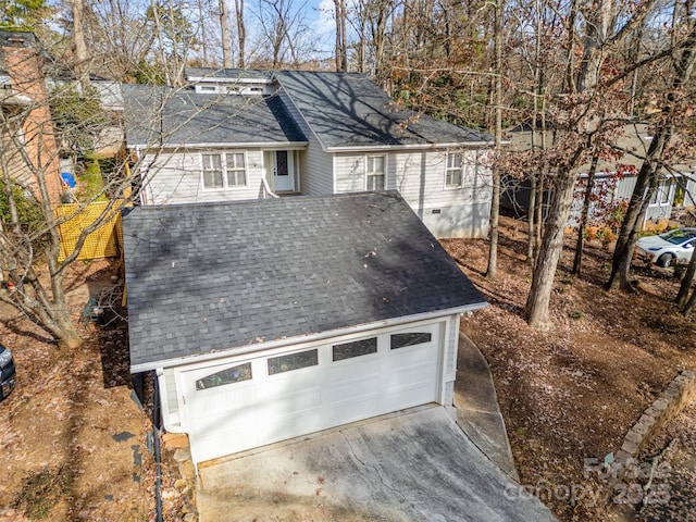 exterior space with a garage