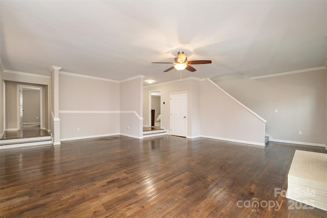 unfurnished living room featuring ceiling fan, dark hardwood / wood-style flooring, and ornamental molding