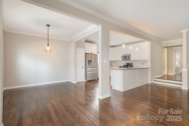 kitchen with light stone countertops, white cabinetry, stainless steel appliances, kitchen peninsula, and pendant lighting