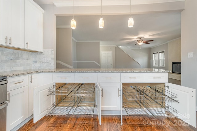 kitchen featuring backsplash and white cabinets