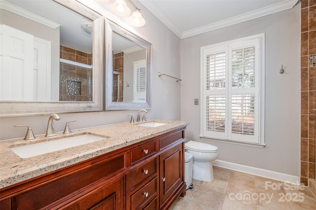 bathroom with vanity, tile patterned floors, crown molding, toilet, and a shower with shower door