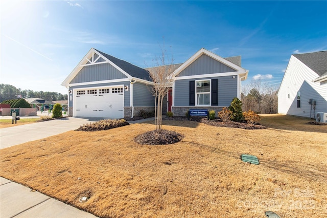 view of front of house with a front lawn and a garage