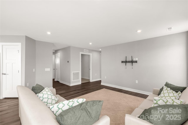 living room with dark wood-type flooring