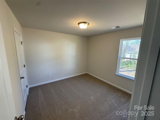 view of carpeted spare room