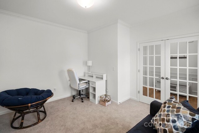 office space with ornamental molding, carpet floors, french doors, and baseboards