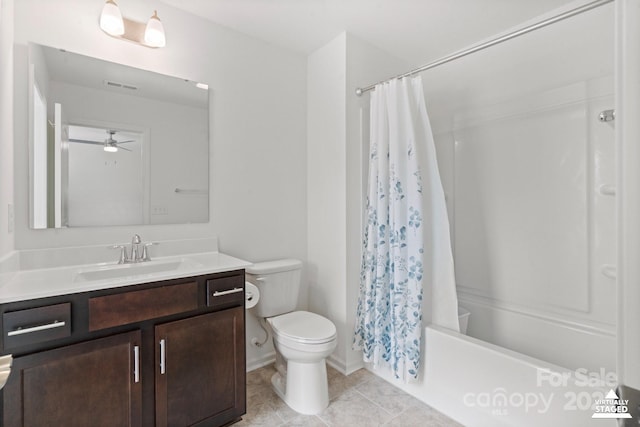 bathroom with visible vents, toilet, shower / bath combo with shower curtain, vanity, and tile patterned floors