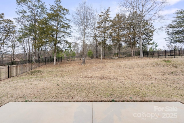 view of yard featuring fence