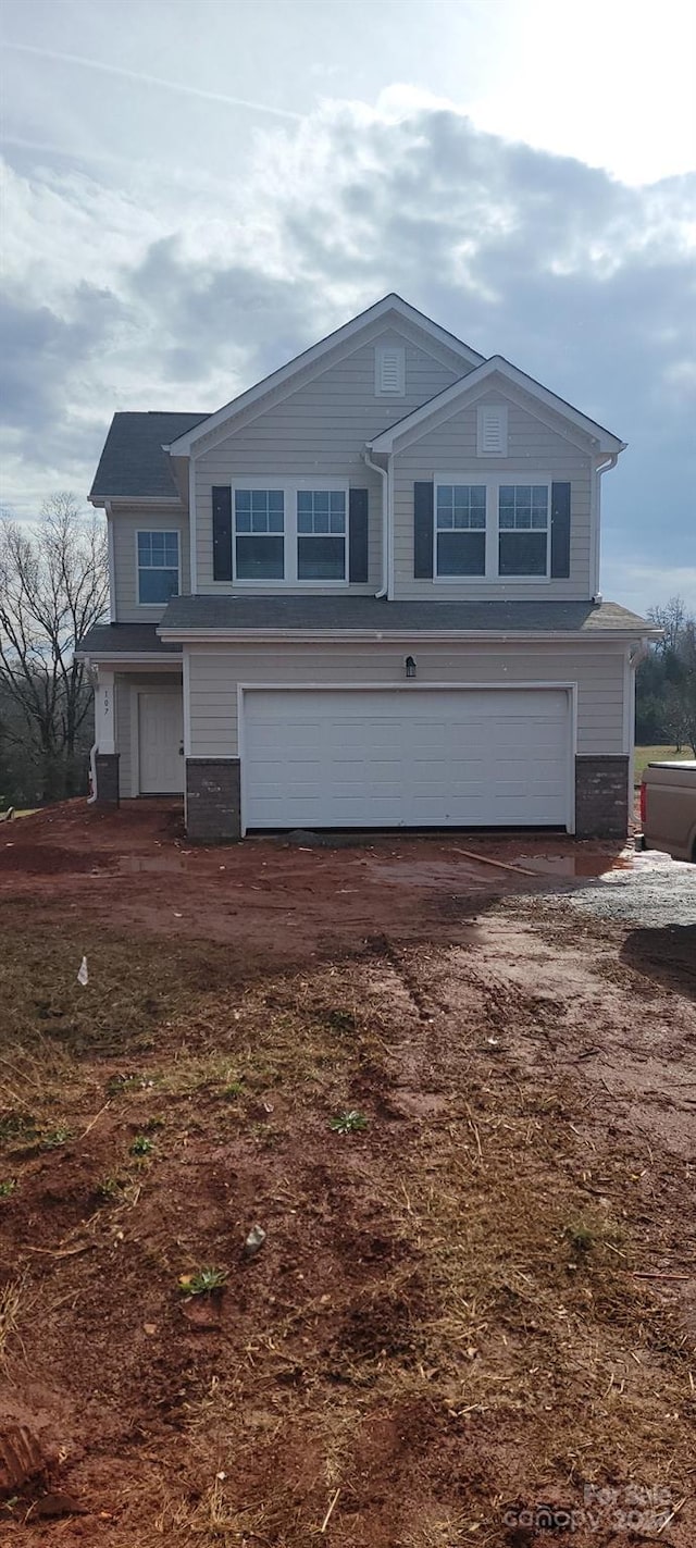 view of front property with a garage