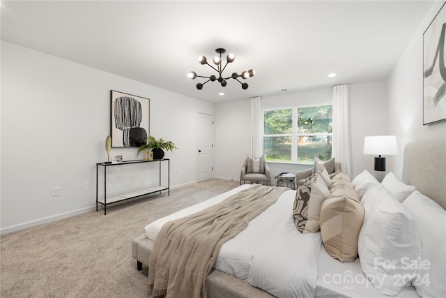 bedroom with light carpet and an inviting chandelier