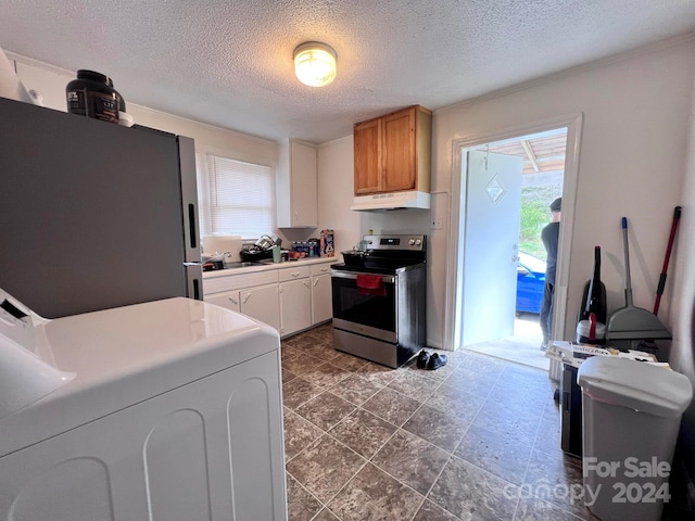 kitchen featuring washer / dryer, white cabinetry, a textured ceiling, and appliances with stainless steel finishes