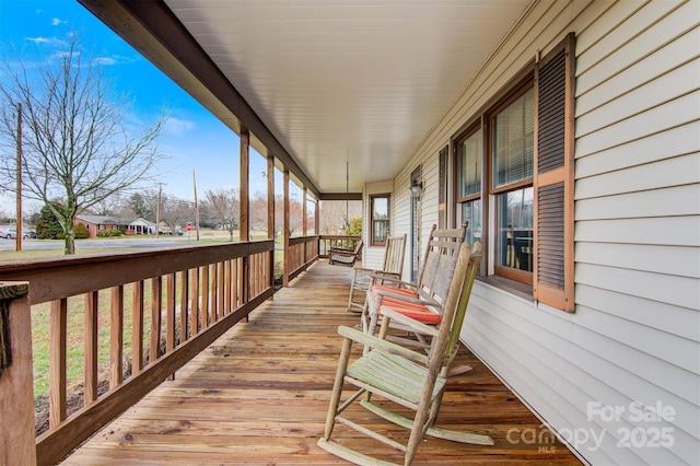 deck with covered porch