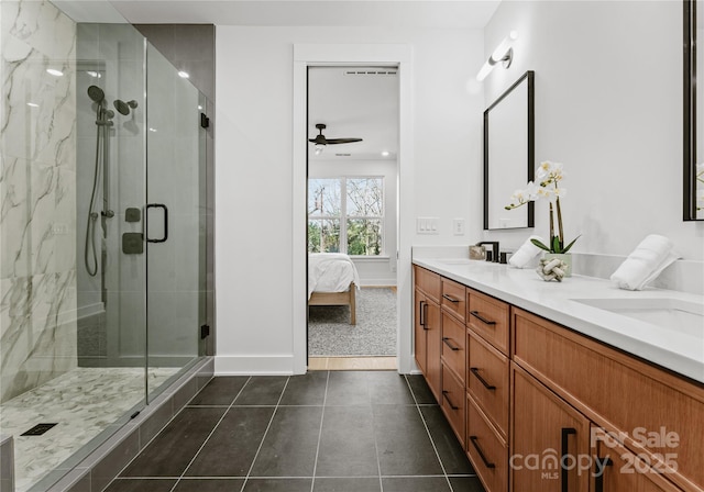 bathroom featuring vanity, tile patterned floors, ceiling fan, and a shower with shower door