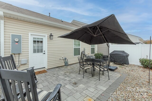 view of patio with a grill