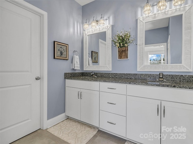 bathroom featuring vanity and tile patterned floors