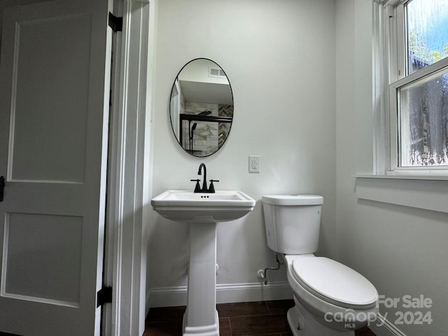 bathroom featuring tile patterned floors and toilet