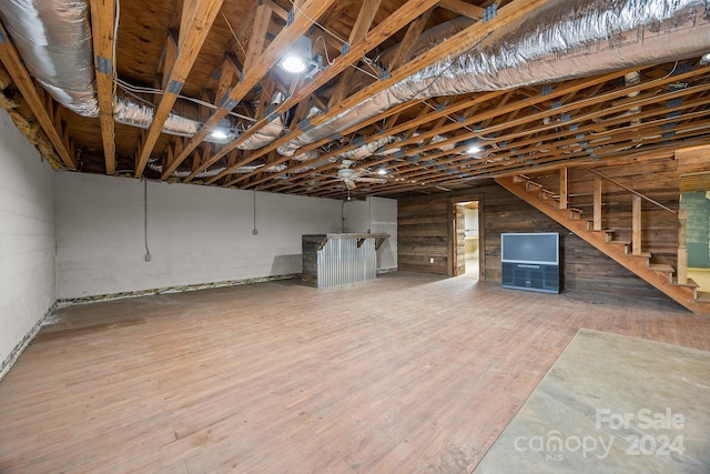 basement with wood-type flooring