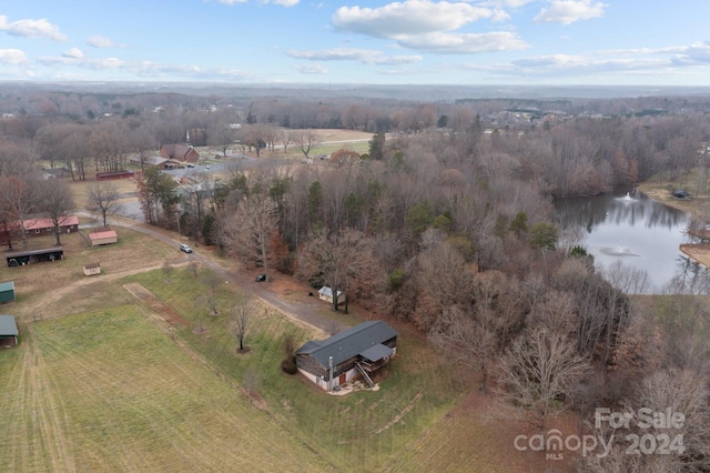 drone / aerial view featuring a water view and a rural view