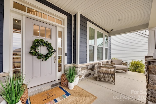 entrance to property with a porch