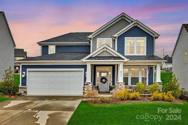 craftsman house with a garage